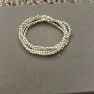 stack of pearl(beaded) bracelets